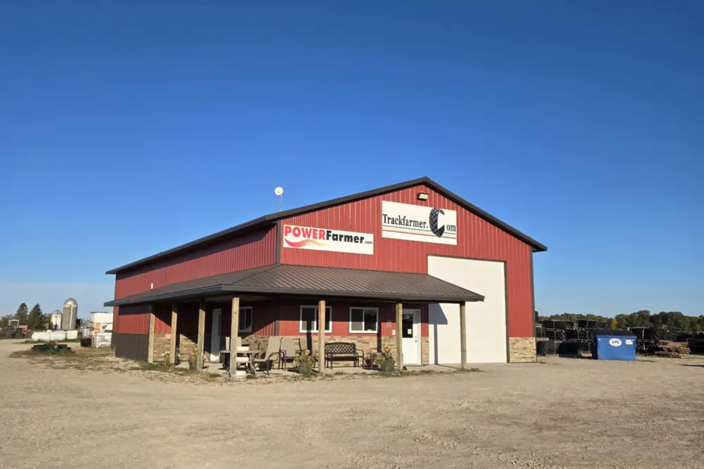 Track Farmer shop with Power Farmer and Trackfarmer.com signs, Long Prairie MN